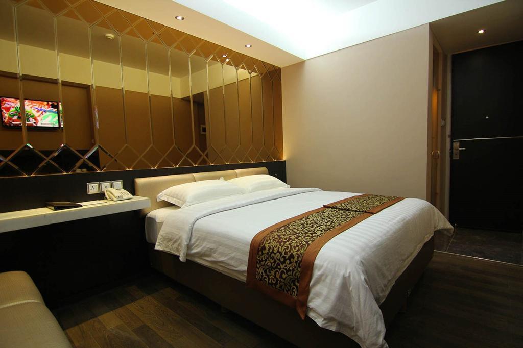 Favor Hotel Makassar Kamer foto